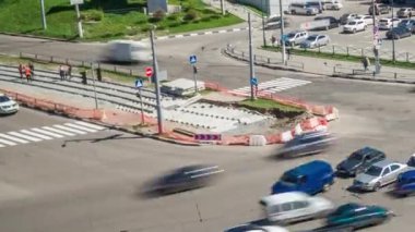 Repair works on the street aerial panoramic timelapse. Laying of new tram rails on a city street. Installation of new modern silent railway rails for trams during reconstruction. Traffic on