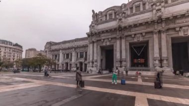 Panorama showing Milano Centrale timelapse - the main central railway station of the city of Milan in Italy. Located on Piazza Duca dAosta near the long boulevard Via Vittor Pisani.