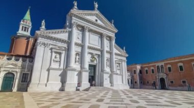 Facade of Church of San Giorgio Maggiore on the island timelapse hyperlapse. One of the main attractions of Venice front view. Blue sky at summer day.