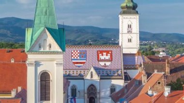 Church of St. Mark timelapse and parliament building Zagreb, Croatia. Top view from Kula Lotrscak tower viewpoint