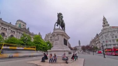 Liberdade square with monument of King Peter IV and Porto city hall, timelapse hyperlapse panoramic view at cloudy day, Porto, Portugal