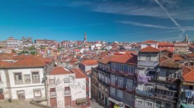 Panorama showing overview of old town of Porto timelapse with houses rooftops from Centro Portugues de Fotografia to City Hall building, Portugal
