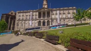 The Palacio da Bolsa timelapse hyperlapse. Stock Exchange Palace with Tower with clock and vane is a historical building in Porto, Portugal