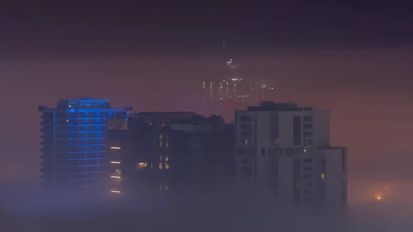 Buildings Covered Thick Layer Fog Business Bay Night Illuminated Skyscrapers — Stock Photo, Image