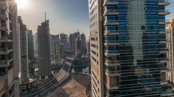 stock image Panorama showing Dubai Marina and JBR area and the famous Ferris Wheel aerial  and golden sand beaches in the Persian Gulf during sunrise