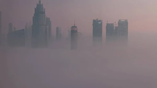 Luftbild Morgennebel Bedeckte Dubai International Financial Centre Bezirk Nacht Tag — Stockfoto
