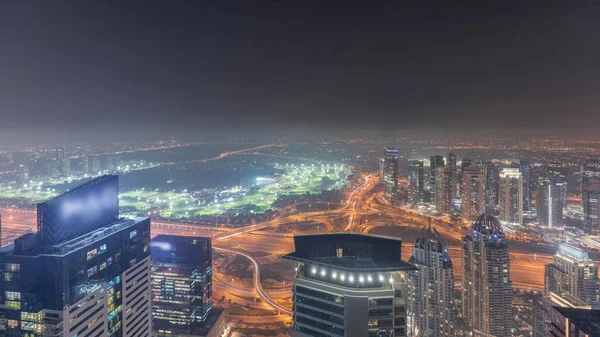 迪拜码头全景 与Jlt摩天大楼和高尔夫球场之夜 阿拉伯联合酋长国迪拜 从塔顶俯瞰空中风景 城市灯光照明 — 图库照片