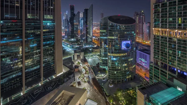 Διεθνές Χρηματοοικονομικό Κέντρο Ντουμπάι Ουρανοξύστες Εναέρια Όλη Νύχτα Φωτισμένοι Πύργοι — Φωτογραφία Αρχείου