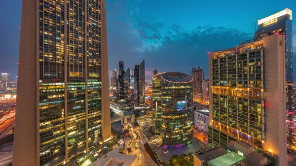 Dubai International Financial Center Skyscrapers Aerial Day Night Transition Illuminated —  Fotos de Stock