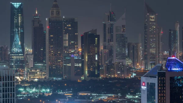 Fileiras Arranha Céus Distrito Financeiro Dubai Aéreo Durante Toda Noite — Fotografia de Stock