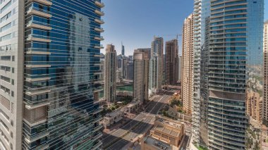 Panorama, Dubai Marina ve JBR bölgesini ve İran Körfezi 'ndeki ünlü Ferris Wheel zaman dilimini ve altın kum plajlarını gösteriyor.