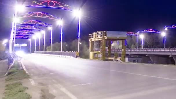 Timelapse Hyperlaps Traffic Bridge Uralsk Iluminated Streets Cast Vibrant Glow — Stock video