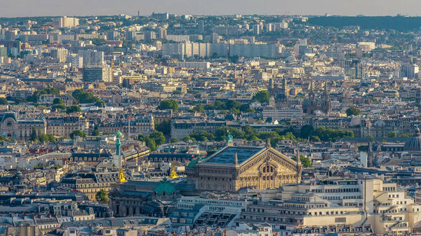 Panorama of Paris from above timelapse, France. Aerial top view from Montmartre viewpoint. With Garnier opera rooftop. Sunny day