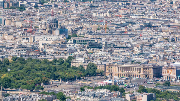 Top view of Paris skyline from above timelapse. Main landmarks of European megapolis with Place de la Concorde and Pantheon. Bird-eye view from observation deck of Montparnasse tower. Paris, France
