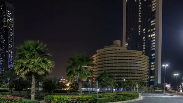 Skyscrapers Abu Dhabi Illuminated Night Etihad Towers Buildings Timelapse Palms — Stock Photo, Image