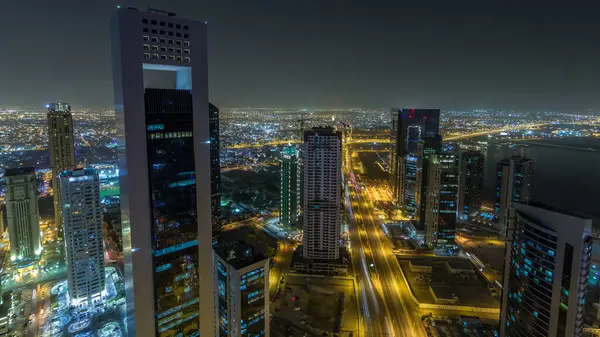 Vestbugtens Skyline Fra Toppen Doha Timelapse Qatar Belyst Moderne Skyskrabere - Stock-foto