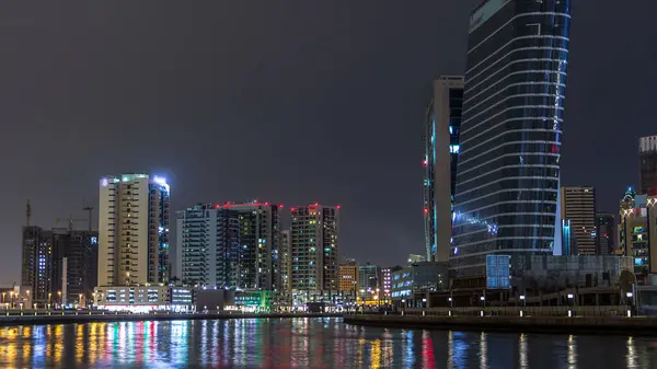 Dubai Business Bay Towers Night Timelapse View Some Illuminated Skyscrapers — Stock Photo, Image