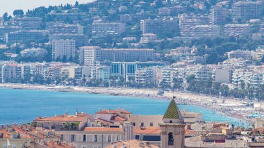 Nice beach landscape aerial top view timelapse, France. Famous Walkway of the English, Promenade des Anglais. Famous French touristic town. Buildings on background clipart