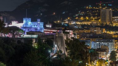 Prince's Palace of Monaco illuminated by night aerial timelapse with observation deck. Official residence of the Prince of Monaco. City skyline clipart