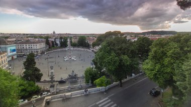 Aerial view of the large urban square, the Piazza del Popolo timelapse, Rome at sunset with heavy clouds above the rooftops of the historical buildings clipart