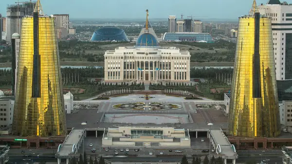 stock image A square in front of Ak Orda with Altyn Orda business center. Aerial view from bayterek tower. Ak Orda is the presidential residence in Astana, the capital of Kazakhstan. Nur-Sultan city