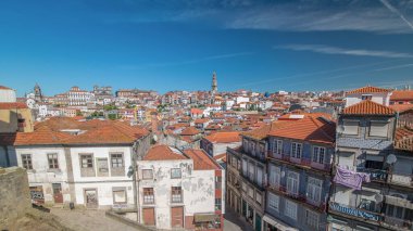 Panorama showing overview of old town of Porto timelapse with houses rooftops from Centro Portugues de Fotografia to City Hall building, Portugal