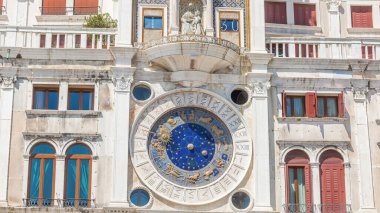 Close up view of Astronomical clock timelapse on square San Marco, Venice, Italy. Sunny day