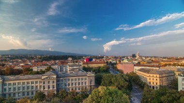 Panorama of the city center timelapse shoot from top of the skyscraper with the intersection in front of national theater and museum in Zagreb, Croatia. Aerial view before sunset