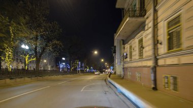 Drive through Traffic of cars in Moscow city streets, timelapse hyperlapse at night Russia Tverskaya Street near the Kremlin. Blurred motion clipart