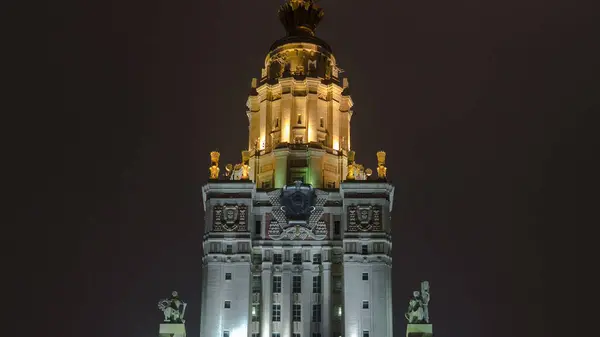 stock image The Tower of Main Building of Moscow State University on Sparrow Hills at Winter Night Hyperlapse. Illuminated Landmark in the Heart of Moscow, Russia