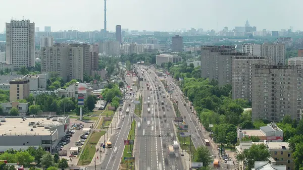 Stock image Top view from above of traffic on the elevated avenue road aerial timelapse overpass on Yaroslavl highway in Moscow, Russia. Ostankino tv tower on background