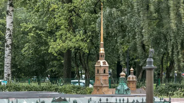 stock image Enchanting Alexander Park Miniature City Timelapse in St. Petersburg: Intricate Model of Peter and Paul Cathedral Amidst Lush Greenery.