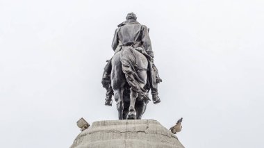 Monument to Jose de San Martin on the Plaza San Martin timelapse hyperlapse in Lima, Peru. Cloudy sky on a background clipart