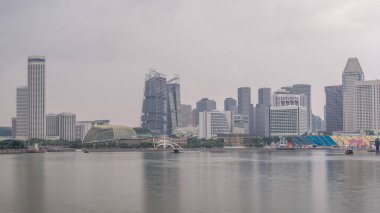 Skyline with skyscrapers of Marina Bay timelapse hyperlapse. With Esplanade world renowned performing arts center. Its twin domes which looks like a durian clipart