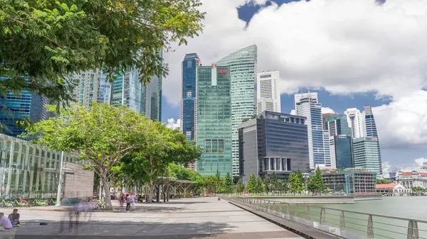 Business Financial Downtown City ve Skyscrapers Tower Building at Marina Bay time-apse hyperlapse, Singapur, Cityscape Urban Landmark and Business Finans District Center