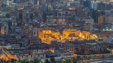 Aerial top view of Lima main square from San Cristobal hill day to night, government palace of Peru and cathedral church. People gathered at Plaza de Armas in the historic center capital of Peru. clipart