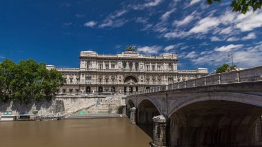 Palace of Justice (Palazzo di Giustizia) timelapse hyperlapse - courthouse building with Ponte Sant' Umberto bridge. Blue cloudy sky. Rome, Italy. clipart