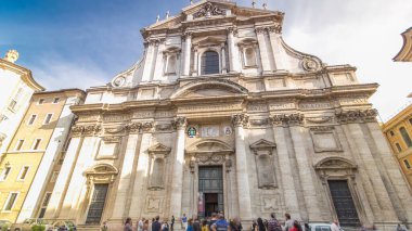 The baroque Church of Saint Ignatius of Loyola at Campus Martius timelapse hyperlapse in Rome, Italy. View before sunset clipart