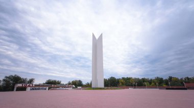 Timelapse Hyperlapse of II World War Monument in Uralsk, Kazakhstan. A Sobering Tribute under a Cloudy Sky, Honoring the Sacrifices and Heroism of the Past clipart