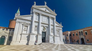 Facade of Church of San Giorgio Maggiore on the island timelapse hyperlapse. One of the main attractions of Venice front view. Blue sky at summer day.