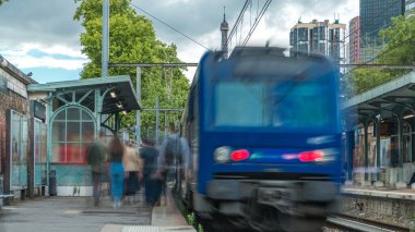 Javel train station with Eiffel tower on background timelapse. French railway station on the Invalides line located in the 15th arrondissement of Paris, in the Javel district. Cloudy sky. France clipart