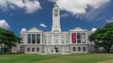 The Victoria Theatre and Concert Hall is a performing arts center in the Central Area of Singapore timelapse hyperlapse. Statue of Sir Stamford Raffles outside of entrance. clipart