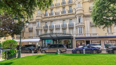 Hotel Hermitage in Monte Carlo timelapse hyperlapse, Monaco. Park in front of it. This historic luxury hotel was built in the early 1900s in the heart of Monte-Carlo. clipart