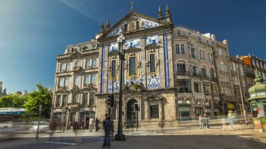 Almeida Garret Square near the Sao Bento railway station with Congregados Church facade at the front timelapse hyperlapse, Porto, Portugal.