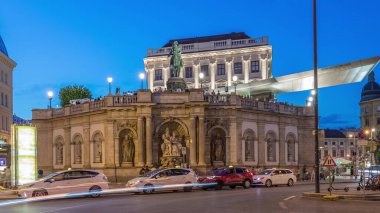 Night view of equestrian statue of Archduke Albert in front of the Albertina Museum day to night transition timelapse in Vienna, Austria. Illuminted buildings on a background clipart