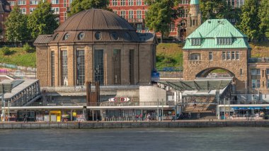 Timelapse of Old Elbe Tunnel entrance and exit in Hamburg, Germany. Located near St. Pauli Piers, featuring historic architecture, ferry station port and panoramic views of the harbor clipart