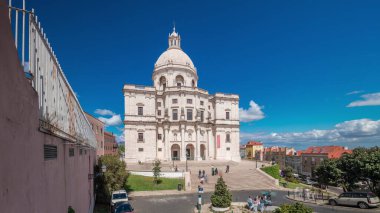 Main facade of National Pantheon aerial timelapse hyperlapse (The Church of Santa Engracia), a 17th-century monument in downtown Lisbon. Clouds on a blue sky. Portugal. clipart