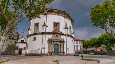Monastery da Serra do Pilar in Vila Nova de Gaia timelapse hyperlapse, Porto, Portugal. Green trees and cloudy sky
