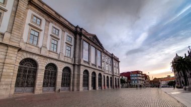 Natural History Museum of Porto University building facade in Gomes Teixeira Square timelapse hyperlapse before sunset. Porto, Portugal.