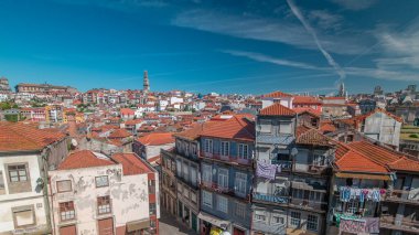 Panorama showing overview of old town of Porto timelapse with houses rooftops from Centro Portugues de Fotografia to City Hall building, Portugal
